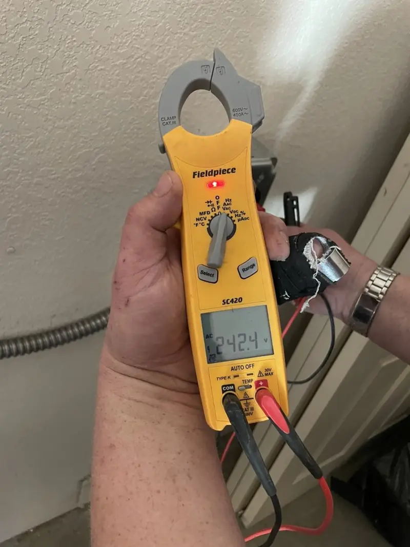 Voltage testing with clamp meter during Aluminum Wiring Replacement in Gladstone